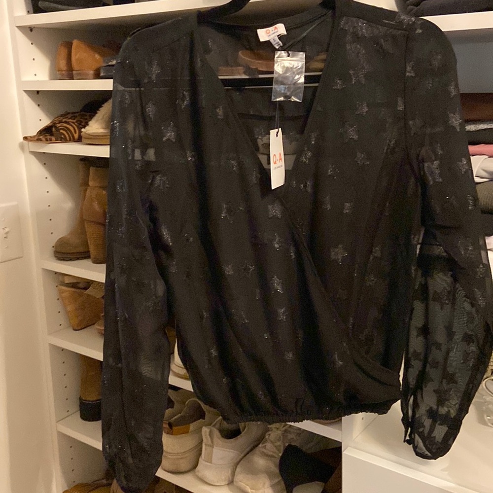 Sheer long sleeve blouse with star details